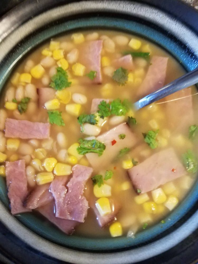 This Crockpot Ham & White Bean Soup is super easy to make and a short ingredient list but don't let fool you, it is bursting with flavor!