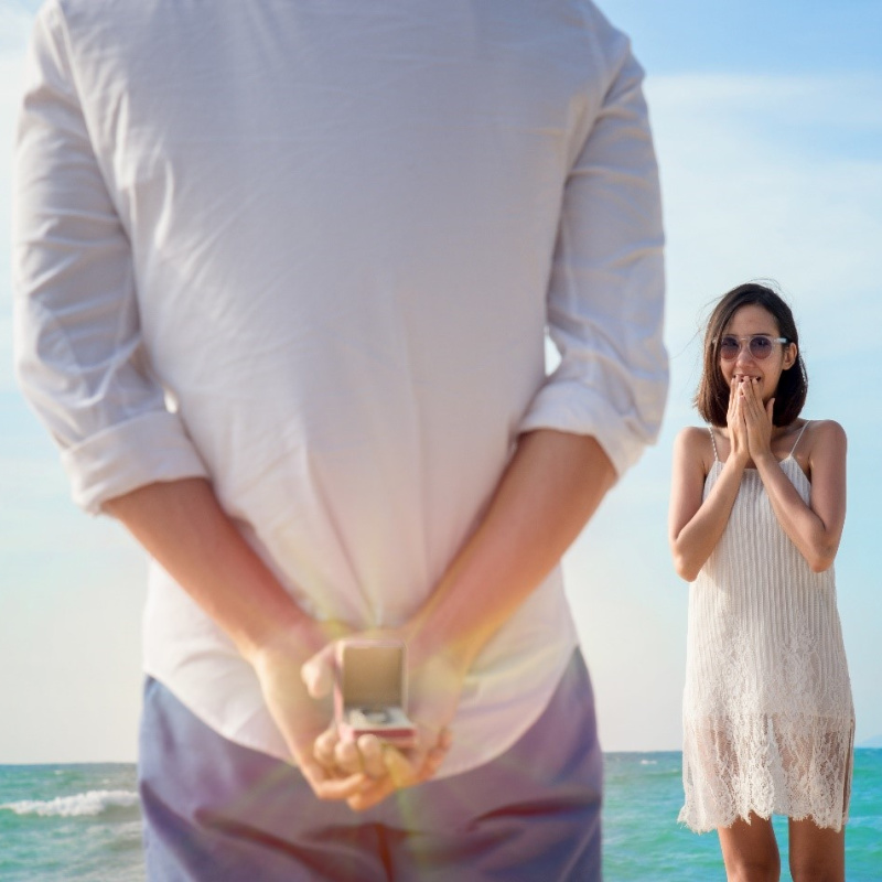 couple standing on beach Evaluate Your Expectations Before Marriage