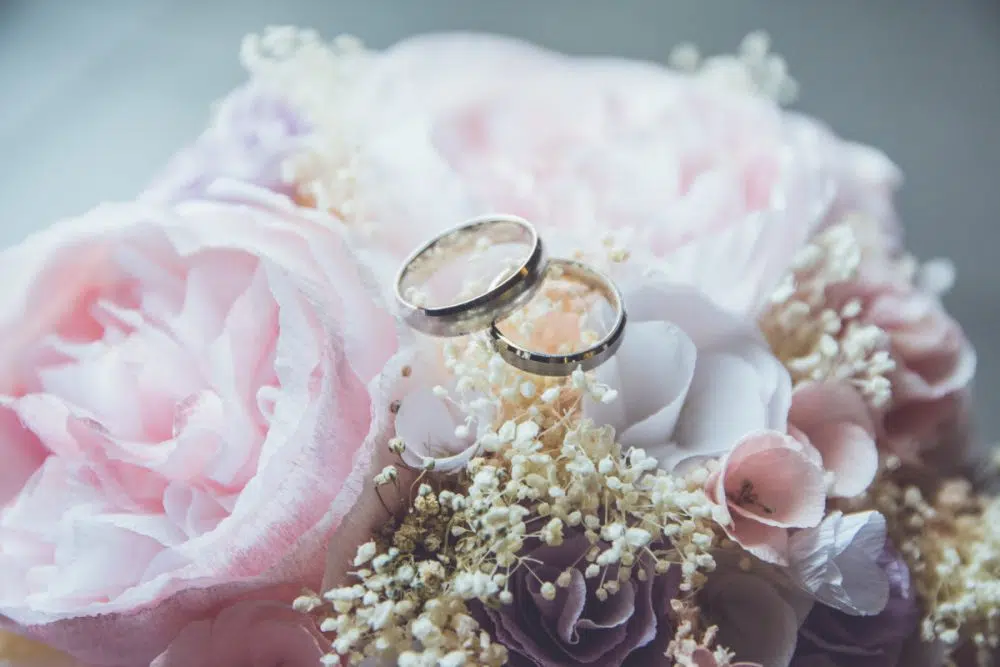 roses and wedding bands