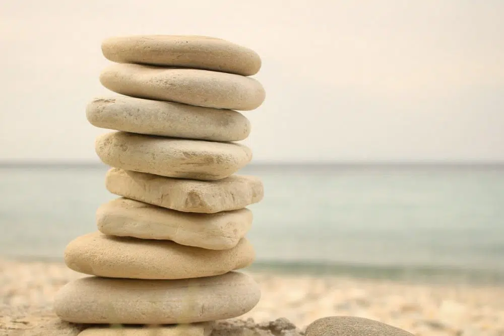 rocks stacked on sand