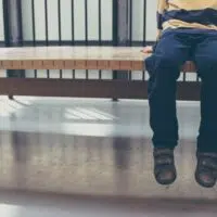 person sitting on bench