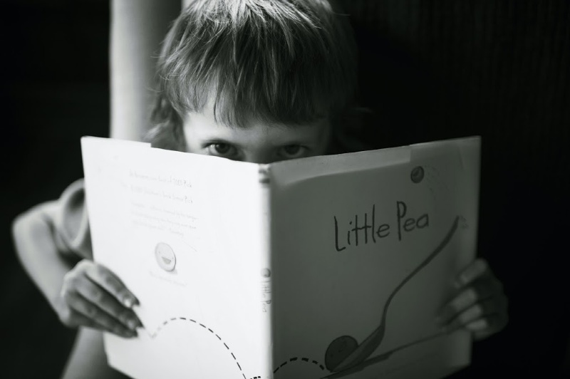 child reading a book