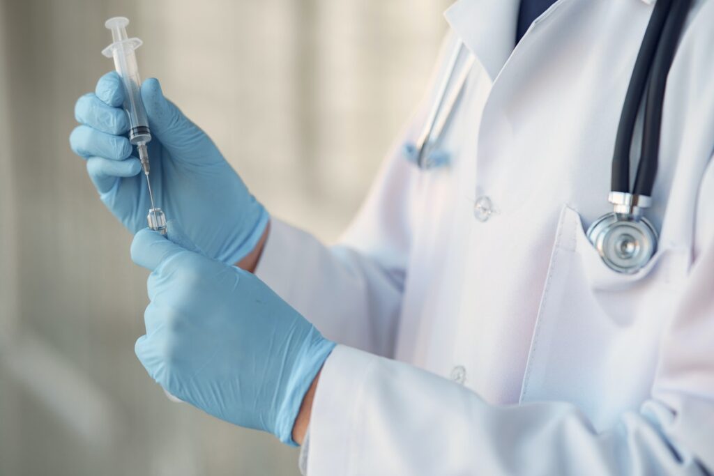 person-in-white-long-sleeve-shirt-holding-injection-398516672-1024x683.jpg