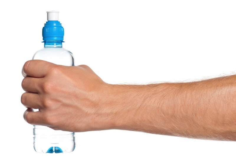 person holding water bottle