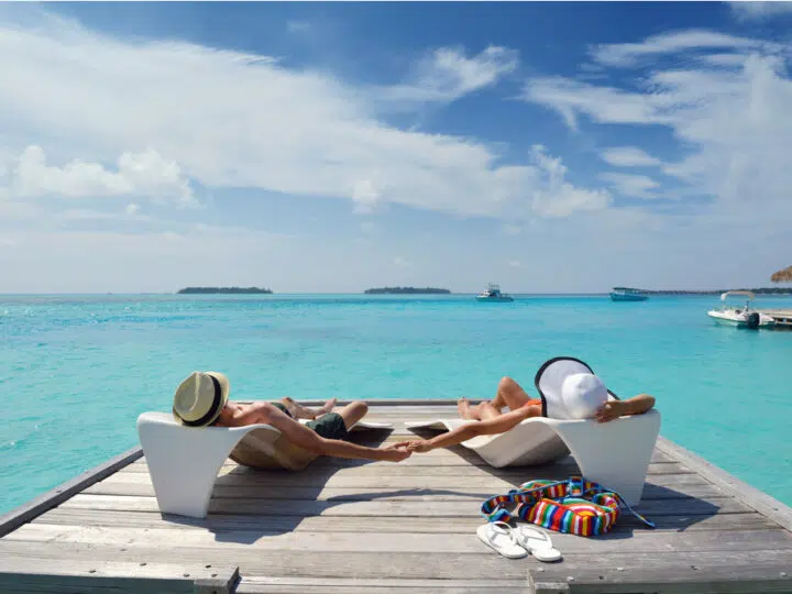 happy young romantic couple in love have fun running and relaxing on beautiful beach