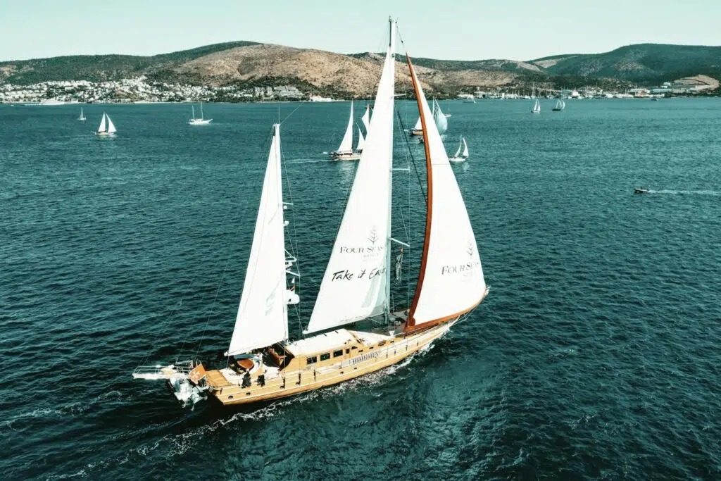 Selecting the right sails for your yacht is one of the most important decisions you&rsquo;ll make as a sailor. The sails you choose not only influence the overall performance of your yacht but also affect how comfortable and safe your sailing experience will be. Whether you're navigating through calm waters or preparing for a competitive race, having the right sails can make all the difference. Here are key considerations that&rsquo;ll help you choose the best sails for your yacht.
Types of Sails
The first step in choosing the right sails is understanding the various types of sails available and their uses. If you&rsquo;re wondering what the two sails on a catamaran are, here&rsquo;s an insight:
Mainsail: The primary sail on most yachts, attached to the mast and boom. It is the largest sail and provides most of the propulsion.
Jib: A smaller sail located in front of the mainsail. It helps balance the yacht and adds extra speed.
However, some catamarans also use other sails like a spinnaker or genoa for downwind sailing in lighter winds. 
Type of Material
When it comes to choosing sails, materials matter as well. You can get reliable options from Far East Sails including:
Dacron: A durable and cost-effective option, commonly used for cruising yachts. It&rsquo;s resistant to UV damage and wear.
Laminated fabrics: These are lighter and stronger materials used for high-performance sailing, such as Mylar and Kevlar.
Carbon fiber: Used for racing yachts, carbon fiber sails are lightweight, strong, and provide excellent performance at high speeds.
Consider Size and Shape
The size and shape of your sails are essential in determining the overall performance and handling of your yacht. When selecting your sails, consider:

Sail area: For cruising yachts, a larger sail area can provide more power, but you need to balance this with ease of handling. Racing yachts, however, often have larger sail areas for speed.
Sail shape: The shape of the sail affects how well it captures wind and how it influences your yacht&rsquo;s balance. A fuller sail shape provides more power but can be less efficient in heavy winds, while a flatter shape is better for control in high winds.
Environmental and Sailing Conditions
Choosing the right sails for your yacht also depends on the environmental and sailing conditions you expect to encounter. For light winds, larger sails like genoas or spinnakers are ideal for maximizing speed. In contrast, in heavy winds, smaller, stronger sails will help maintain control and safety.

UV rays and high humidity can degrade sail materials over time. Dacron sails perform well in these conditions, but for longer trips or in harsh environments, high-tech materials such as carbon fiber might be a better option. If you're cruising in tropical waters or regions with constant winds, you may need sails that are more resistant to sun damage and saltwater corrosion.
Budget Maintenance
When selecting sails, budget plays a significant role in your decision-making process. While high-performance sails may come with a higher price tag, they can offer better durability and efficiency, which may be worth the investment in the long run. Consider the initial cost of the sails as well as the ongoing maintenance needs when making your decision.
Endnote
How To Choose The Best Sails For Your Yacht