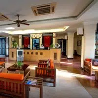 Inviting hotel reception with a warm, contemporary design and vibrant seating.